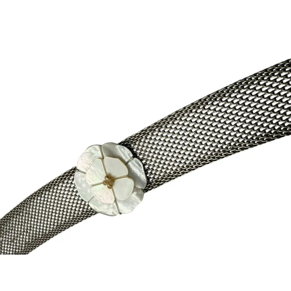 CHANEL Camellia with mesh silver choker collar.